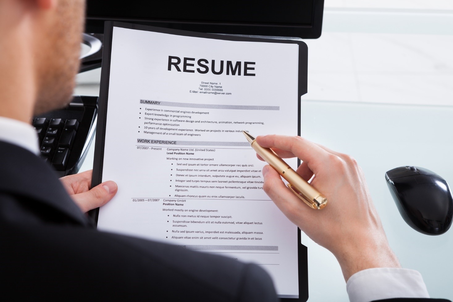 Applicant reviewing past work history for a resume